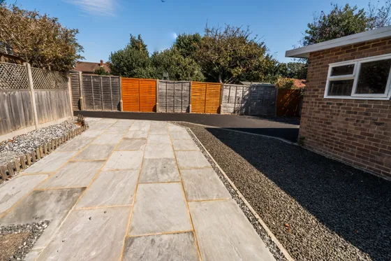 Sandstone paving alongside a new drive